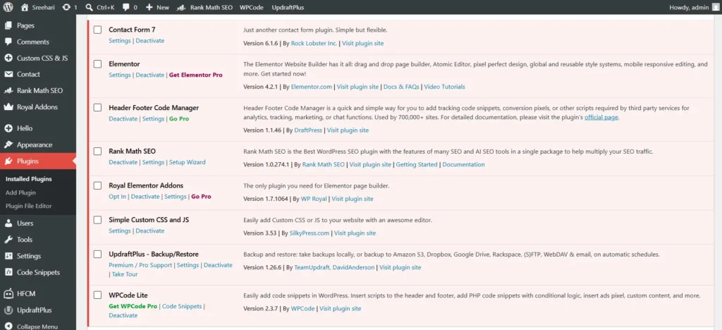 WordPress admin dashboard displaying active plugins including Rank Math SEO and UpdraftPlus.